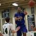 Pioneer senior Tevis Robinson passes in the first half against Father Gabriel Richard on Tuesday. Daniel Brenner I AnnArbor.com